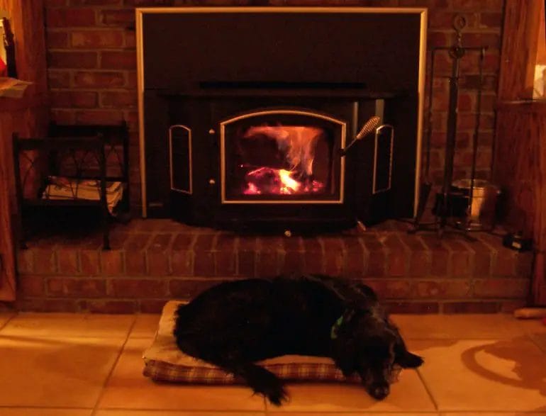how to keep a wood stove burning all night
