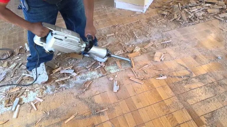 how to remove glued down wood flooring
